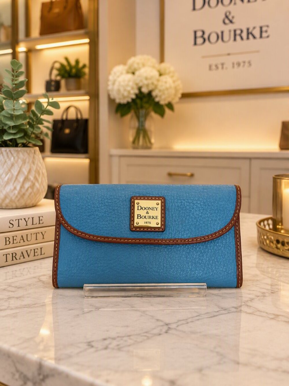 Dooney & Bourke Sky Blue Pebbled Leather Wallet with Brown Trim